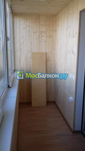 Отделка балконов деревянной вагонкой в Москве