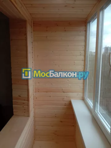 Отделка балконов деревянной вагонкой в Москве