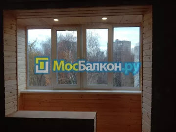 Отделка балконов деревянной вагонкой в Москве
