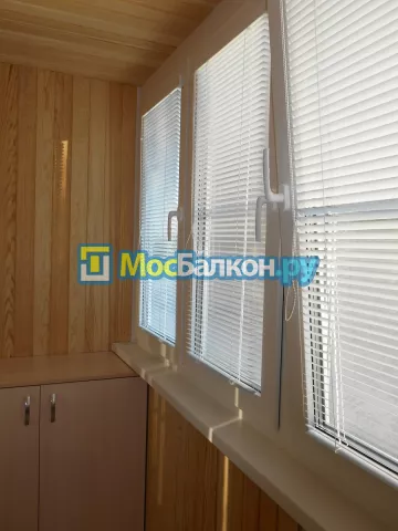 Отделка балконов деревянной вагонкой в Москве